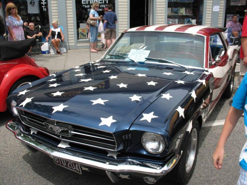 an old car painted like the american flag