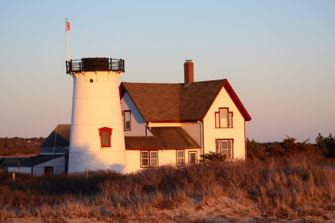 a light house at sunset