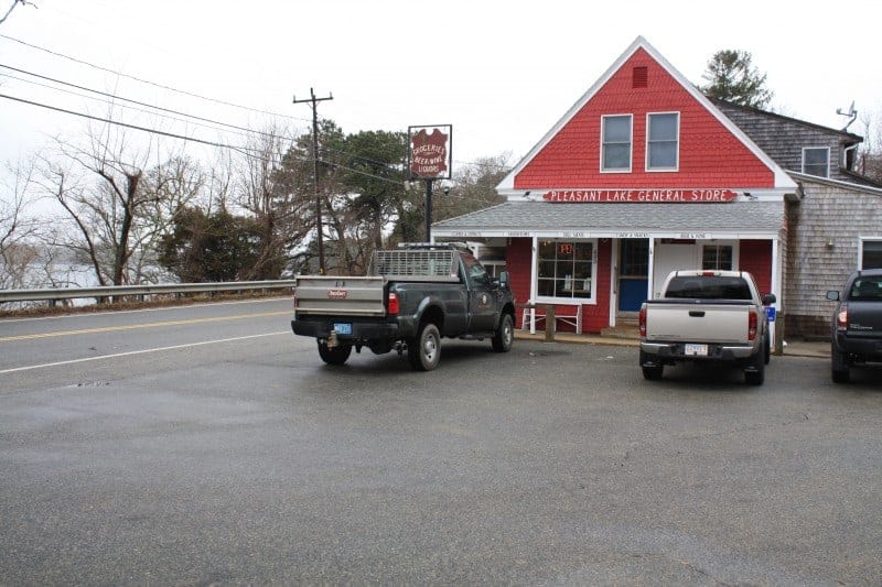 exterior photo of Pleasant Lake General Store, with a few trucks parked outside