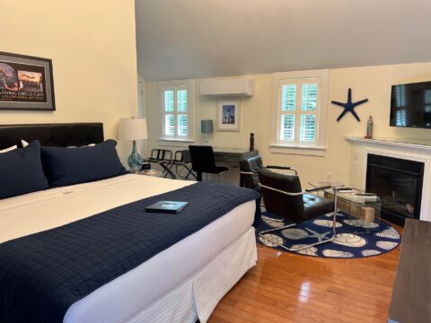 Guest bedroom with white and navy blue decor