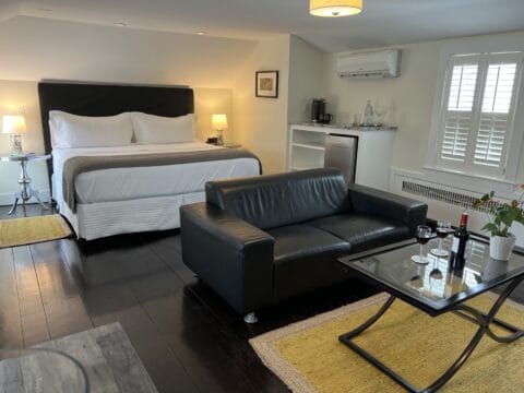 Guest bedroom with yellow and black accents