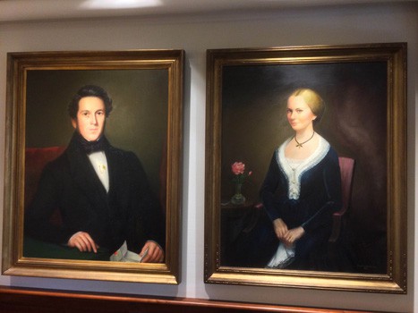 Antique portraits of a man and a woman
