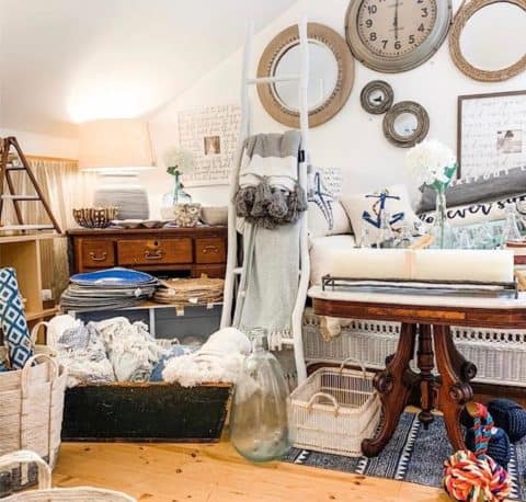 the inside of a store showing a variety of housewares, many with a nautical theme