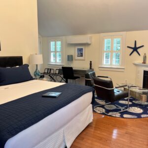 Luxury King Room #8 in the carriage house with a king size bed and blue and white decor